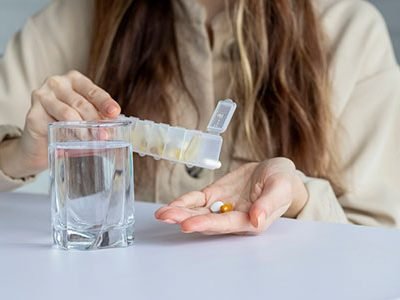 Woman getting her medication